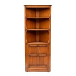 Ercol, a pair of stained elm corner cabinets,