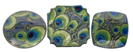 Janice Tchalencko for Dartington pottery three stoneware dishes: each decorated in the peacock