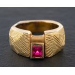 An 18ct gold, pink, rectangular, step-cut, synthetic spinel ring,