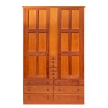 Conran, a contemporary cherrywood compactum wardrobe,