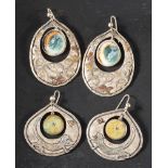 Charmian Harris, two pairs of drop earrings,: one with ammonite pendants,