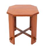 An oak occasional table in Art Deco style, circa 1930,: the octagonal top on four straight supports,