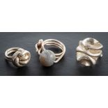 Helen Fieler, three silver rings, one with a banded agate bead,: with Sheffield hallmarks, 1998-9,