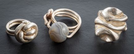 Helen Fieler, three silver rings, one with a banded agate bead,: with Sheffield hallmarks, 1998-9,