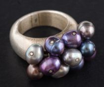 A silver and cultured, freshwater pearl ring,: diameter of cultured pearls ca. 6.4-7.
