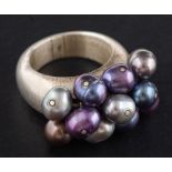 A silver and cultured, freshwater pearl ring,: diameter of cultured pearls ca. 6.4-7.