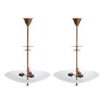 A pair of circular glass dish ceiling lights: on slender and flat knopped stems, 48cm diameter.