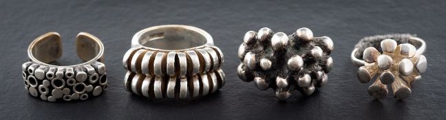 Four modernist rings:, including a ring by S Paliu, Spain, a ring by David Andersen, Norway,