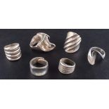 Six modernist rings,: five rings stamped '925', ring sizes K-P, total weight ca. 84.2gms (6).