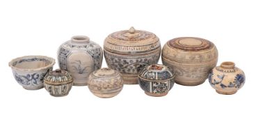 A group of South Asian ceramics: including five covered bowls, two jars and a bowl with barbed rim,