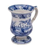 A mid 19th century English blue and white pearlware frog mug: of baluster form with scroll handle