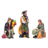 A group of three Royal Doulton figures 'Fortune Seller',