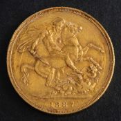 A Queen Victoria gold sovereign coin, 1887,: diameter ca. 22mms, total weight ca. 7.8gms.