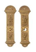 A pair of 19th century brass door finger plates: of rectangular outline with grotesque mask and