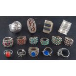 A collection of Indian rings,: set with, amongst others, vari-coloured enamel, turquoise,