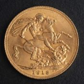 A George V gold sovereign coin, 1913,: diameter ca. 22mms, total weight ca. 7.9gms.