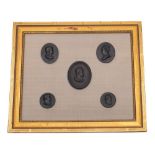 A group of five Wedgwood black basalt portrait medallions: including Emperors of Rome and Virgil,