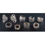 Nine modernist rings,: four of openwork design, one with maker's mark 'JDH',
