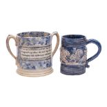 A 19th century Staffordshire 'Order of Odd Fellows' commemorative frog and serpent loving-cup and a