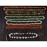 A collection of eight bead necklaces,: including rose quartz, agate, carnelian, coral,