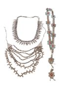 A collection of Middle Eastern silver jewellery,: includes a seven string neck lace,