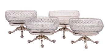 A set of four clear glass table salts: of rectangular outline,