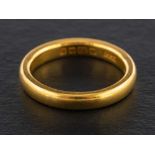 A 22ct gold band ring,: with hallmarks for Birmingham, 1929, ring size I, total weight ca. 4.5gms.
