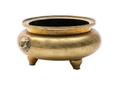 A small Chinese bronze tripod censer: of globular form with waisted neck and mythical beast mask