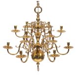 A brass twelve branch two-tier graduated chandelier: in the early 18th Century Dutch taste,