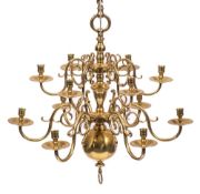 A brass twelve branch two-tier graduated chandelier: in the early 18th Century Dutch taste,