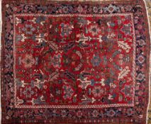An Afghanistan carpet:, the rose field with all over geometric designs,