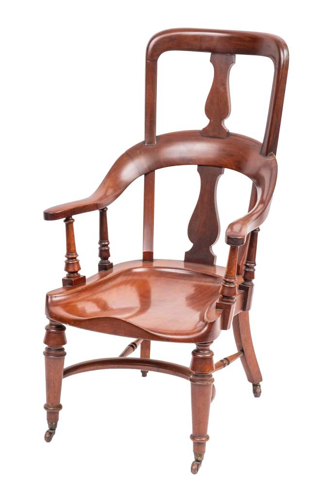 A Victorian mahogany library or desk elbow chair, second half 19th century,