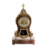 A French boulle mantel clock and stand: the eight-day duration movement striking the hours and