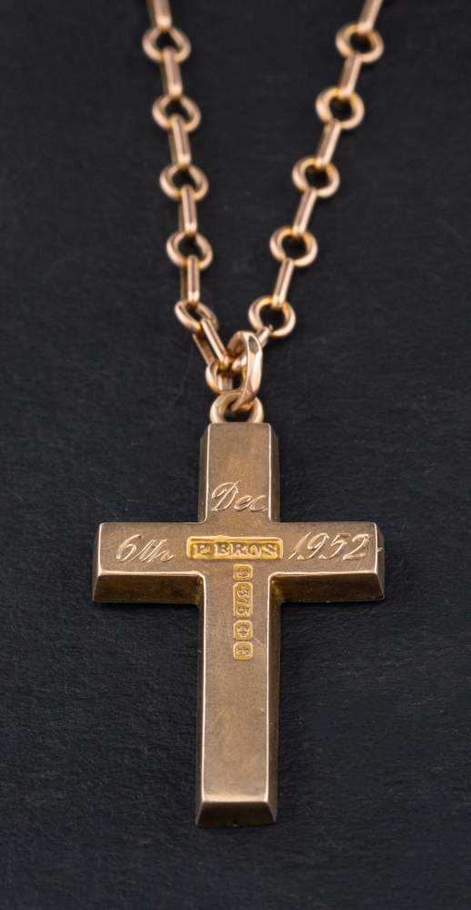 A 9ct gold cruciform pendant,: with hallmarks for Birmingham and engraving to verso,