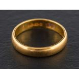 A 22ct gold band ring,: with hallmarks for Birmingham, ring size N1/2, total weight ca. 4.2gms.