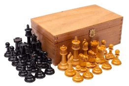 A boxwood and ebonised Staunton pattern unweighted chess set: attributed to F Ayres, the king, 7.