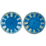 A pair of zinc turret clock dials: having gilt Roman numerals on a blue ground, diameter 178cm.