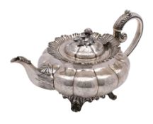 A 19th century Indian colonial silver teapot, maker Lattey Brothers & Co, Calcutta,