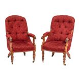 A near pair of Regency rosewood and button upholstered library elbow chairs, circa 1815,