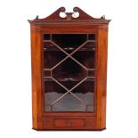 A Regency mahogany and glazed hanging corner cabinet, early 19th century,