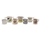 A group of seven 19th and 20th century frog loving-cups and mugs: with coloured transfer and