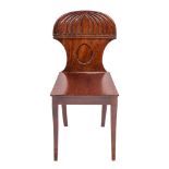 A Regency mahogany hall chair, in the manner of Gillow, circa 1815,