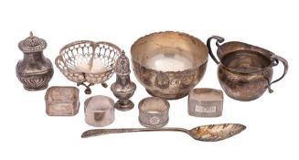 A mixed lot of silverwares, various makers and dates: includes berry spoon, sugar basin,