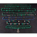 A collection of six bead necklaces,: including four of malachite,