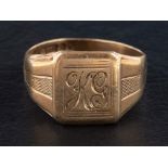 A 9ct gold signet ring,: engraved with monogram 'KG', with hallmarks for London, 1964, ring size N,