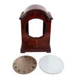 A substantial mahogany bracket clock case and round silvered dial: with brass bezel and glass,