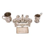 A Victorian silver mug, maker Robert Harper, London, 1860: inscribed, of baluster form,