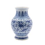 A Chinese blue and white baluster vase: painted in Ming style with scrolling lotus and peony