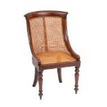 A Regency mahogany and canework library bergere, circa 1815,