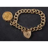 A 9ct gold curb-link bracelet and heart-shaped clasp with a George V full gold sovereign coin fob,